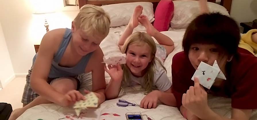 Children making origami