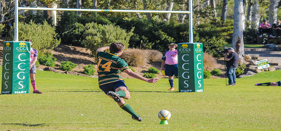 Boy-kicking-goal-in-rugby