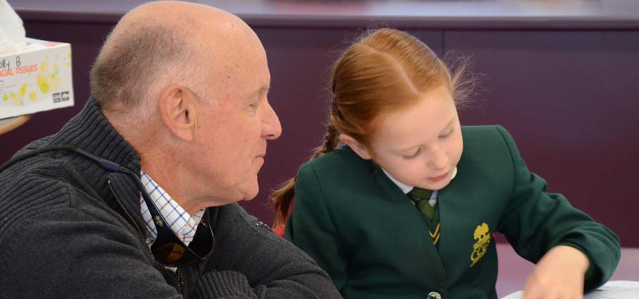 grandfather-with-granddaughter-in-classroom
