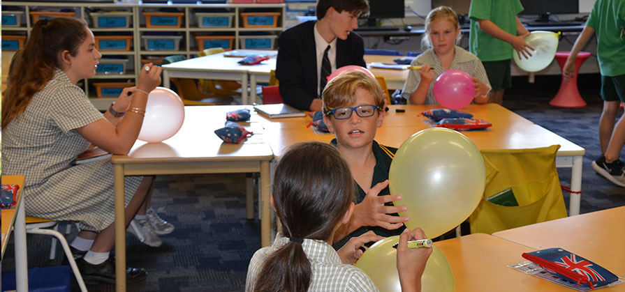 students-play-with-balloons